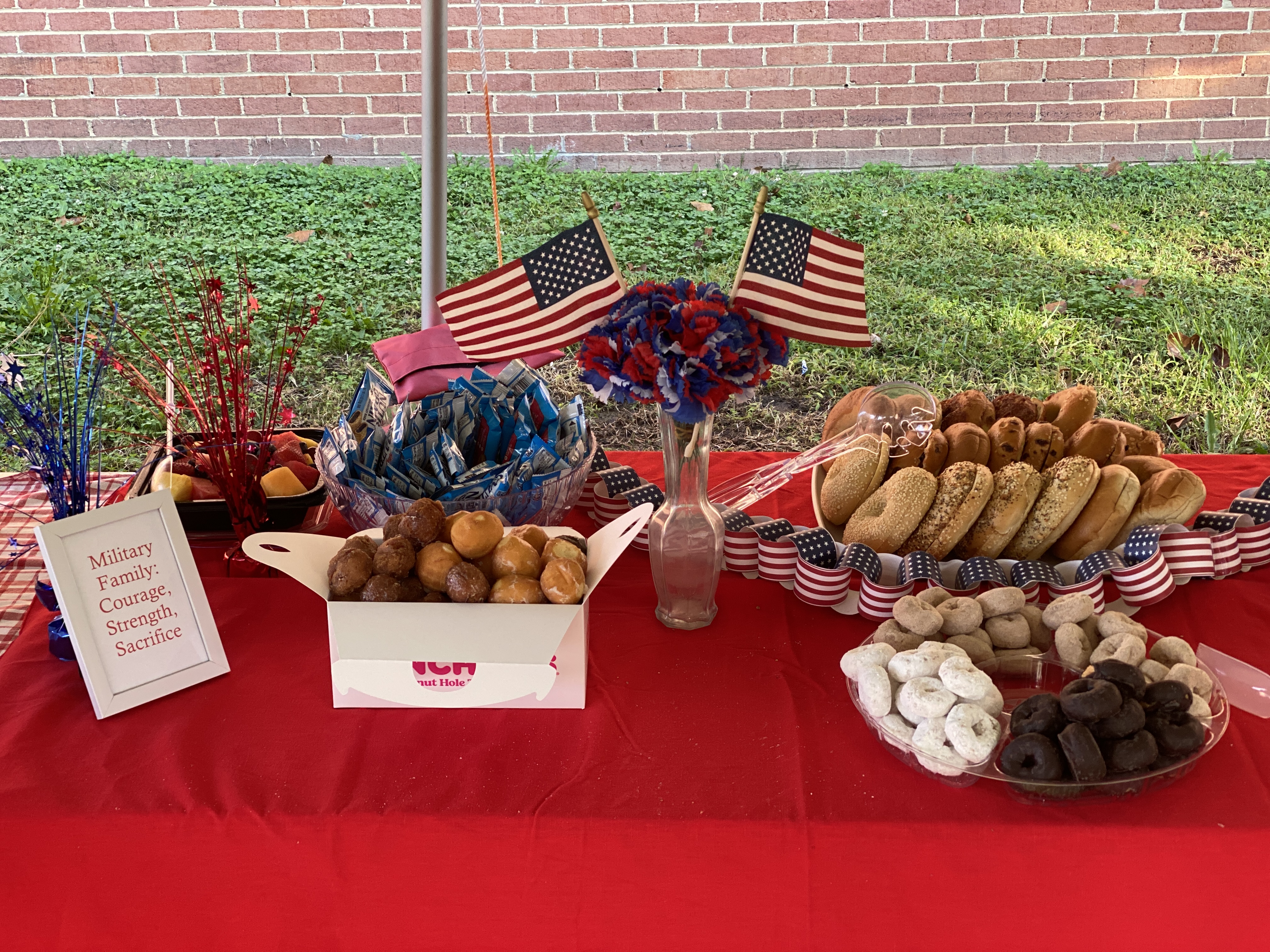 table of breakfast donuts and patriotic decor
