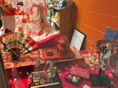 photo of display case containing various Japanese items